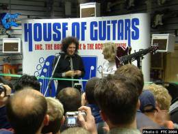Concert photo: Brian May live at the House Of Guitars, Brune St., London, UK (opening) [08.01.2004]