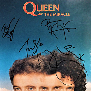 fake Queen autographs - official fan club - male hand