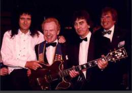 Guest appearance: Brian May live at the Grosvenor House Hotel, London, UK (Water Rats Ball with Phil Collins, Dec Cluskey, Joe Brown, Lonnie Donnegan, George Harrison and Bert Weedon)